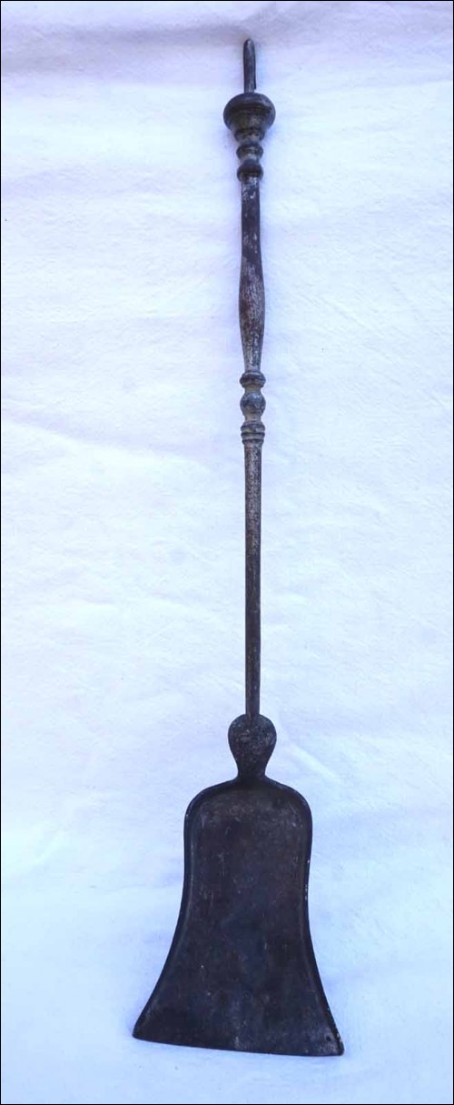 French fireplace wrought iron ash shovel made during the 1900's. 27 1/8